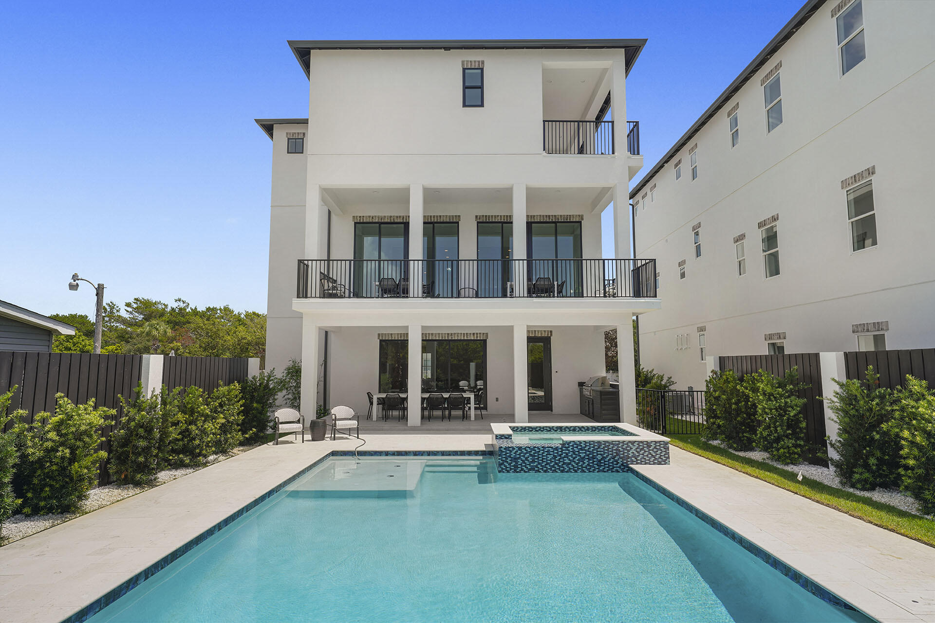 336 South Holiday Road Destin, FL 32550 - Photo 2 of 40 a view of house with yard in front of it