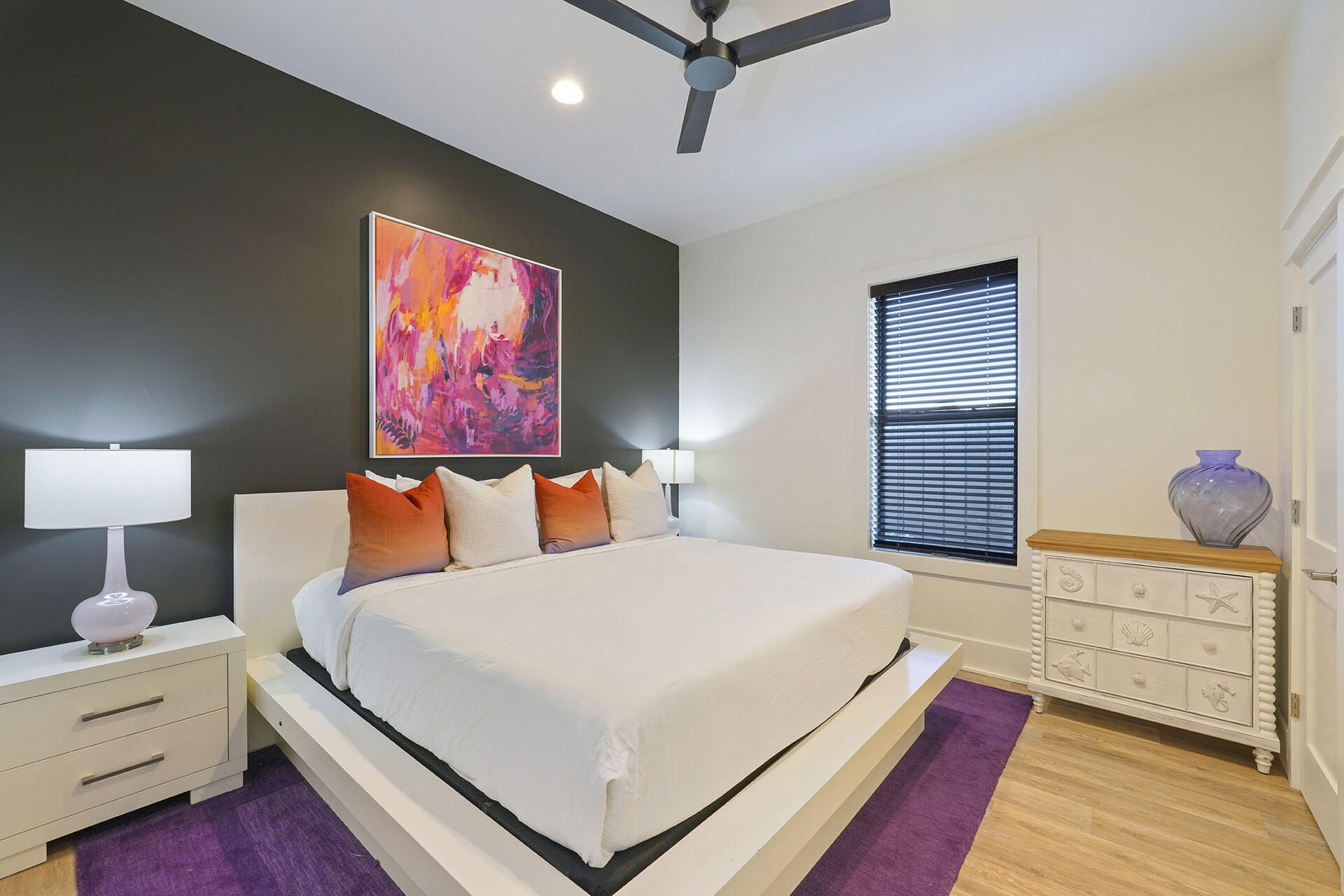 336 South Holiday Road Destin, FL 32550 - Photo 24 of 40 a bedroom with a bed and a dresser