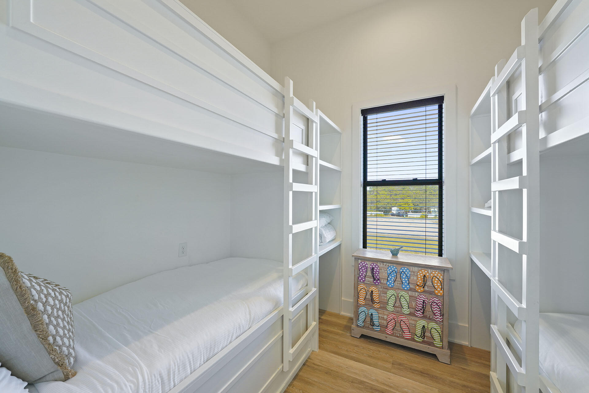 336 South Holiday Road Destin, FL 32550 - Photo 27 of 40 a utility room with stainless steel appliances wooden floor and window
