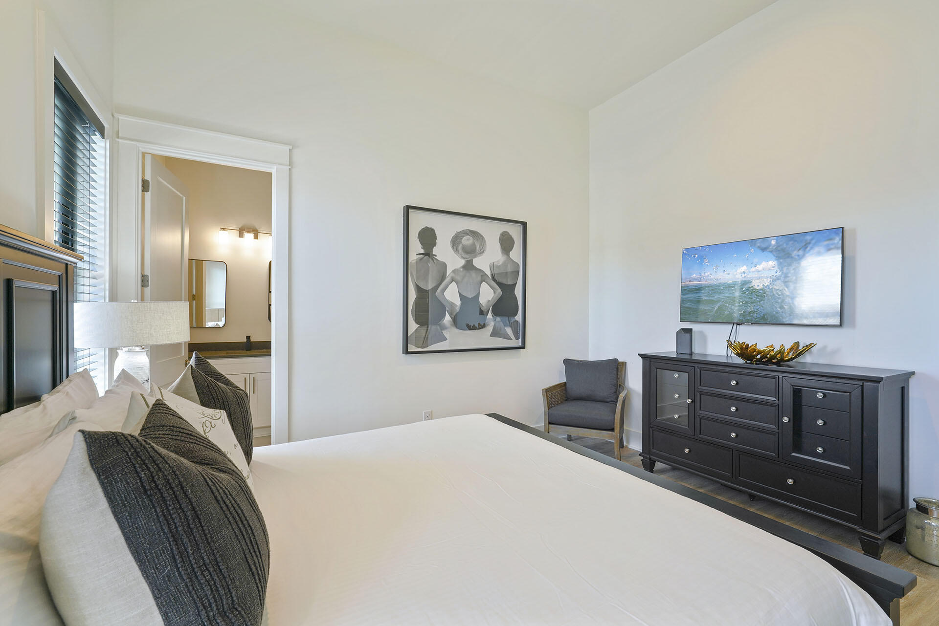 336 South Holiday Road Destin, FL 32550 - Photo 28 of 40 a bedroom with furniture and a flat screen tv