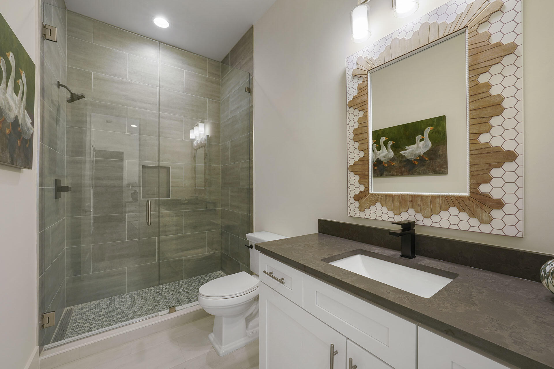 336 South Holiday Road Destin, FL 32550 - Photo 33 of 40 a bathroom with a granite countertop sink a toilet and a shower