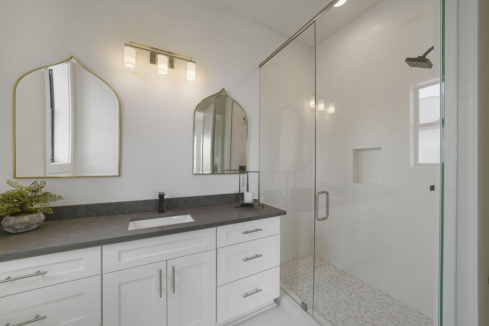 336 South Holiday Road Destin, FL 32550 - Photo 36 of 40 a bathroom with a double vanity sink and a mirror