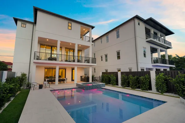 a front view of a house with swimming pool