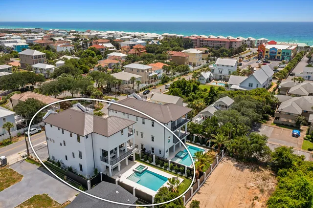 an aerial view of a highlighted house