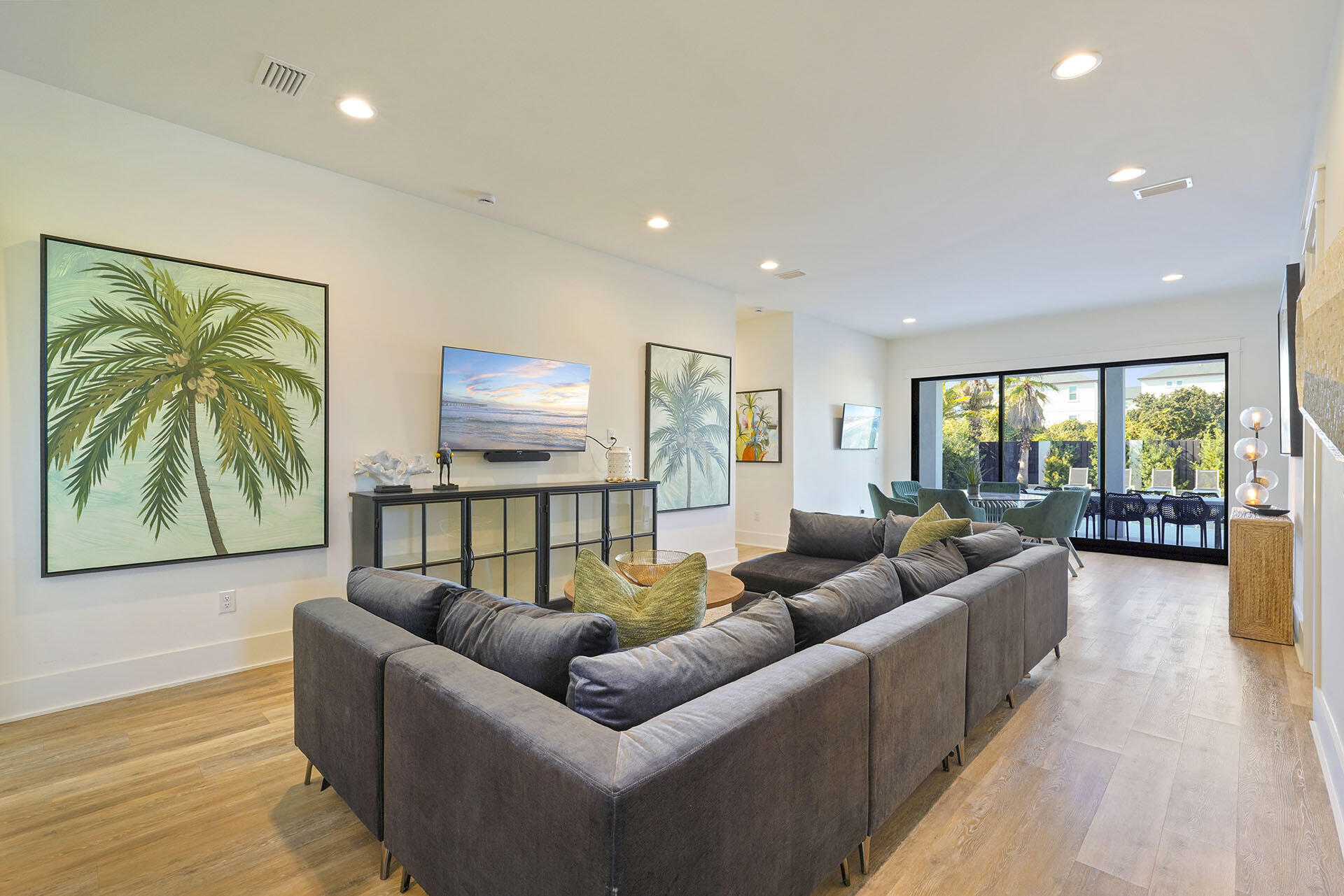 336 South Holiday Road Destin, FL 32550 - Photo 6 of 40 a living room with furniture and a flat screen tv