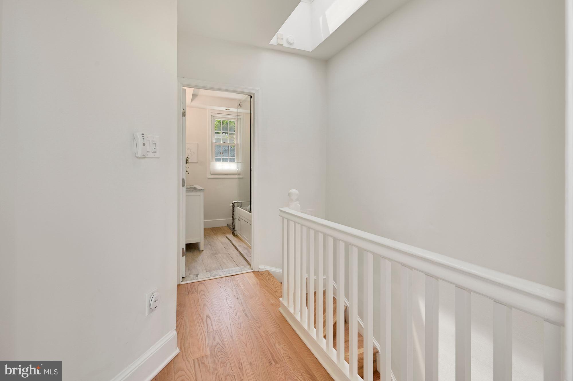 1391 D Street Northeast Washington, DC 20002 - Photo 12 of 39 Skylight brightens upper bedroom level