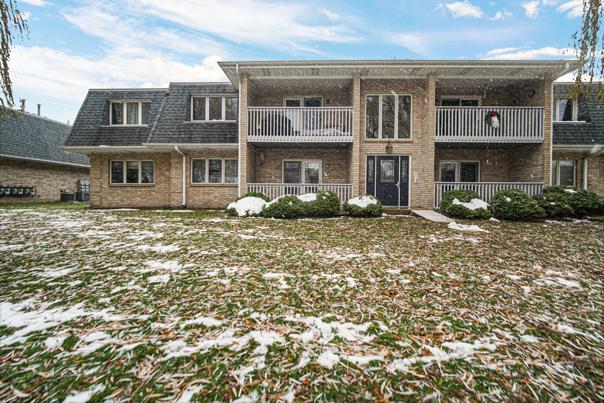 9320 Spring Creek Drive, Unit 3 Highland, IN 46322 - Photo 24 of 26 a front view of a house with a yard