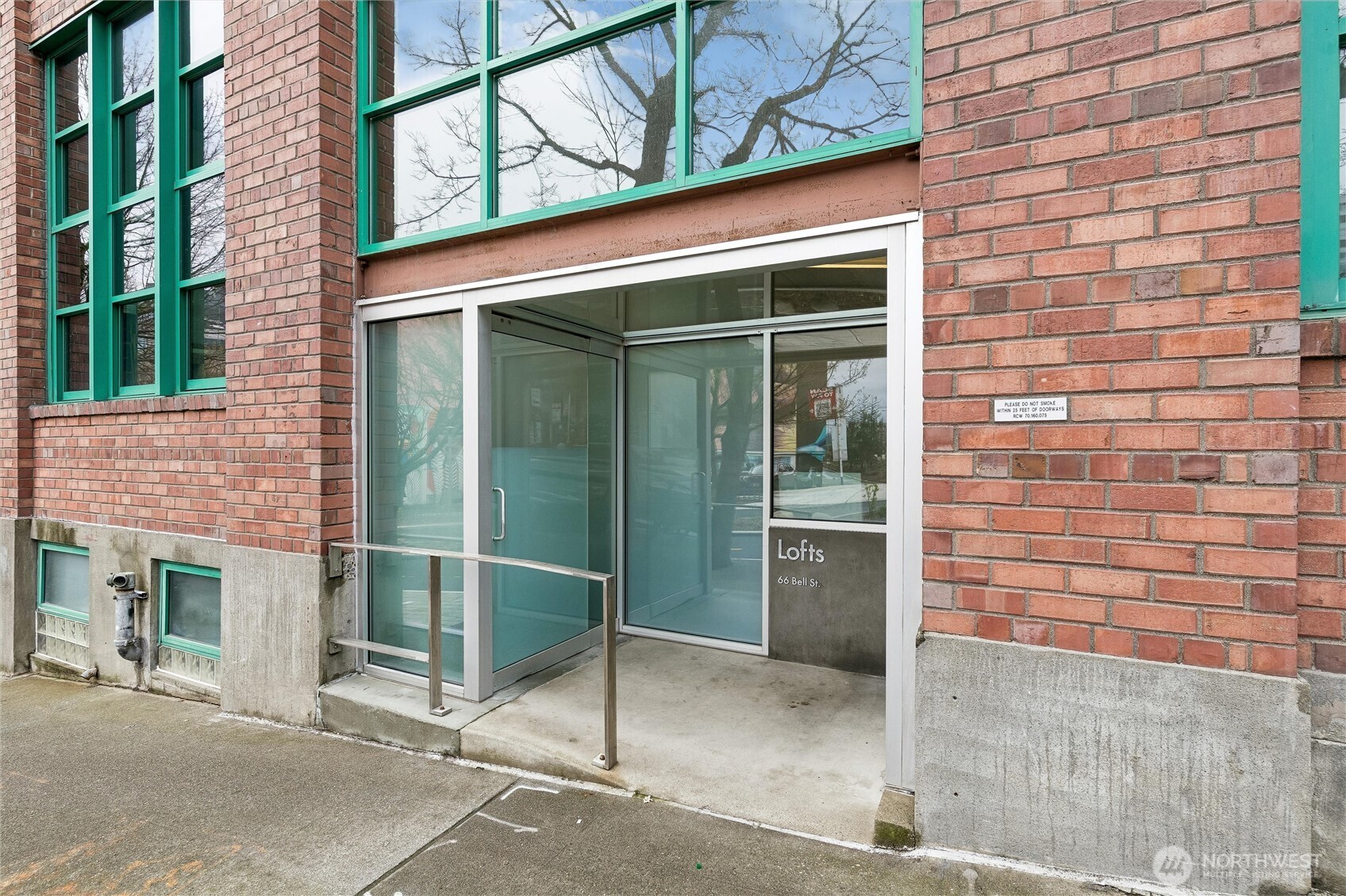 66 Bell Street, Unit 23 Seattle, WA 98121 - Photo 2 of 24 a view of entrance gate of a building