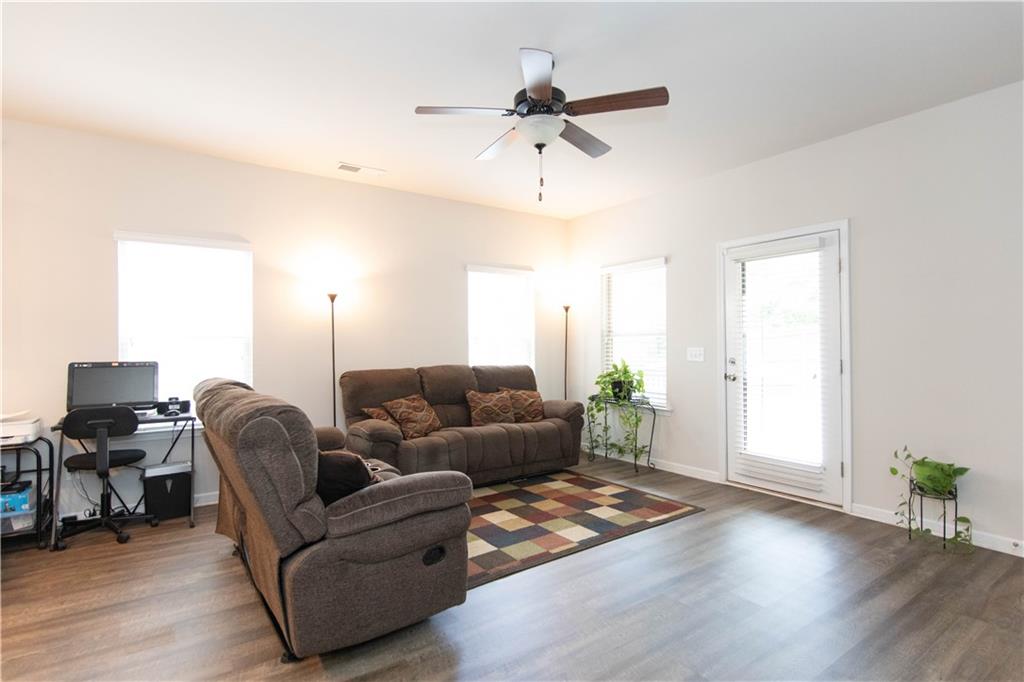 103 Prominence Court Canton, GA 30114 - Photo 12 of 34 a living room with furniture