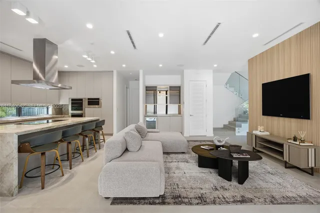 a spacious bathroom with a bathtub and shower