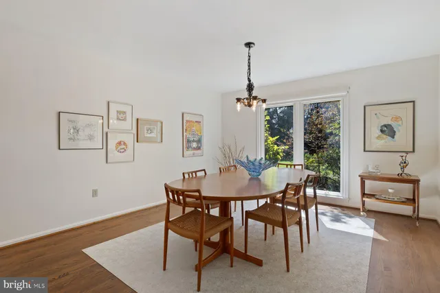 a kitchen with sink and cabinets
