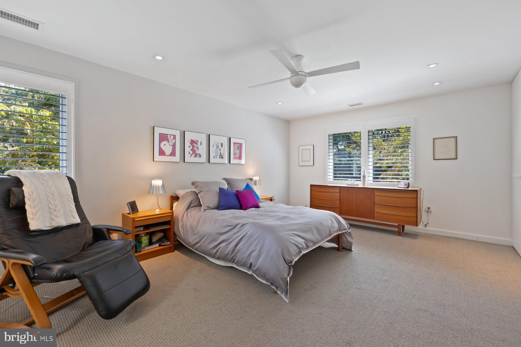 16400 Montecrest Lane Gaithersburg, MD 20878 - Photo 37 of 58 a bedroom with a bed and wooden floor