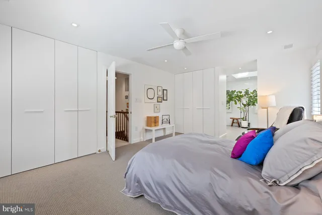 a room with gym equipment and a flat screen tv