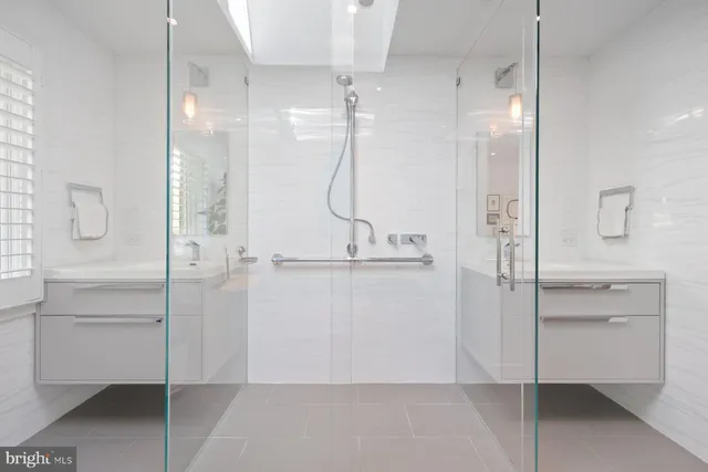 a view of a outdoor with a table and chairs under an umbrella