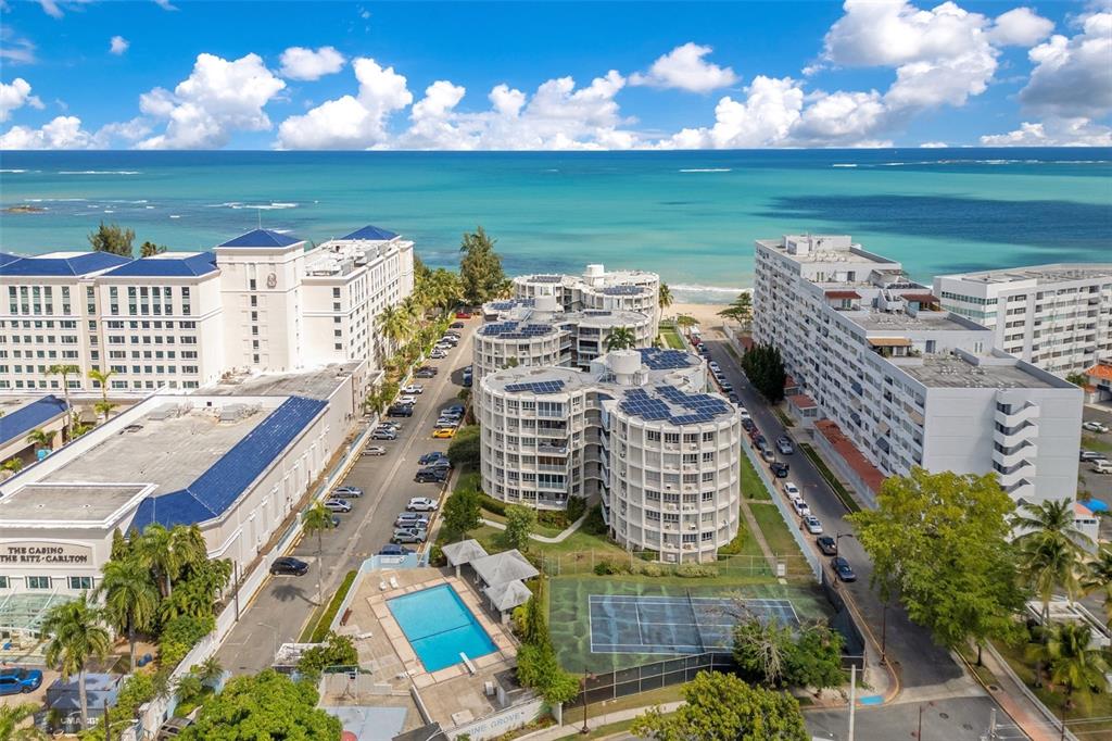 a view of a city with an ocean view