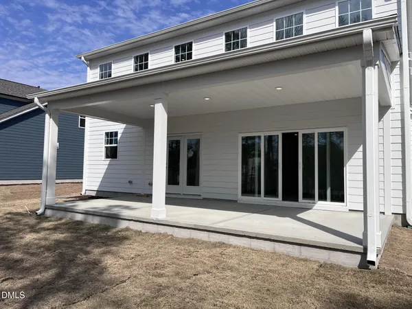 a view of a house with a large window