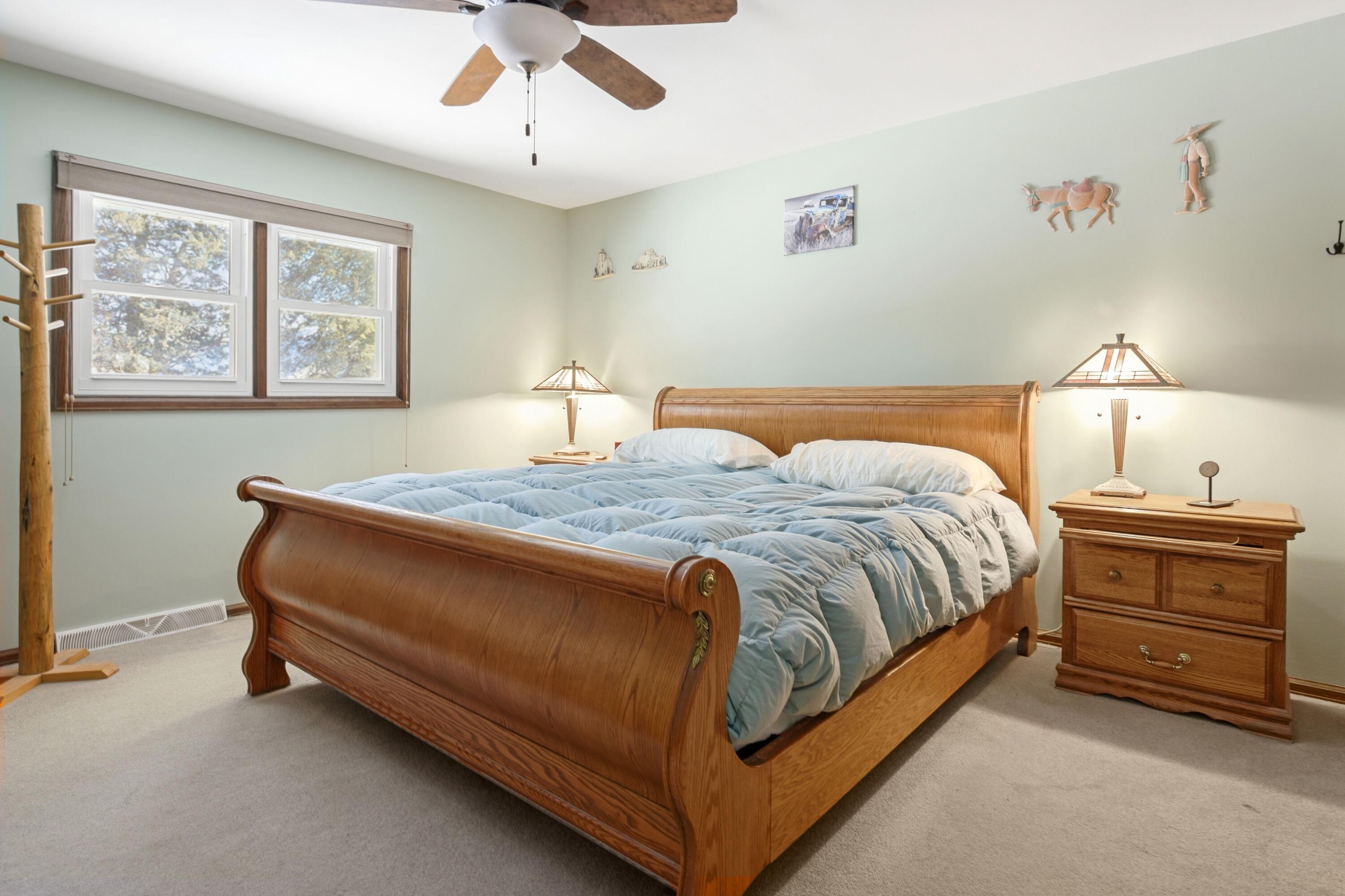 3641 North Main Street North Bay, WI 53402 - Photo 14 of 17 Sunny spacious primary bedroom