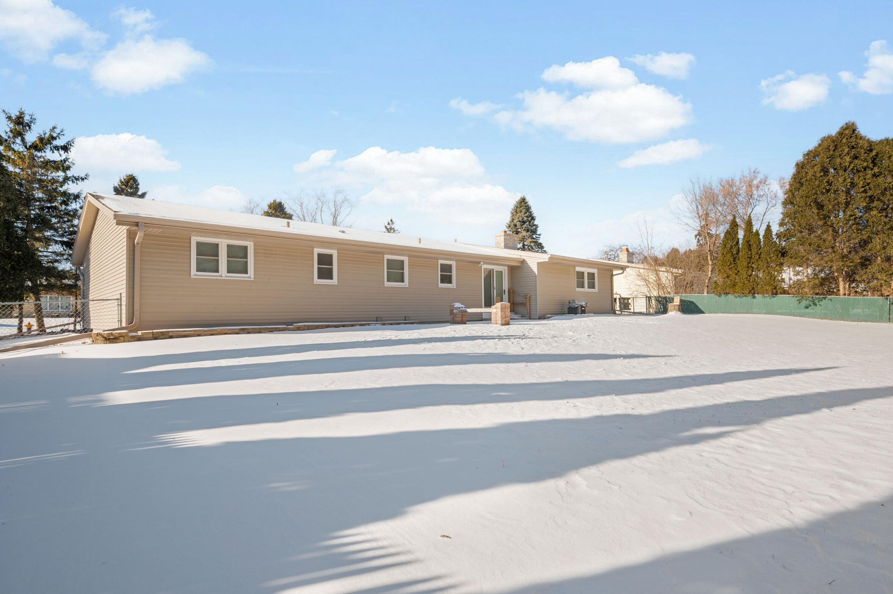 3641 North Main Street North Bay, WI 53402 - Photo 16 of 17 View of fenced in backyard