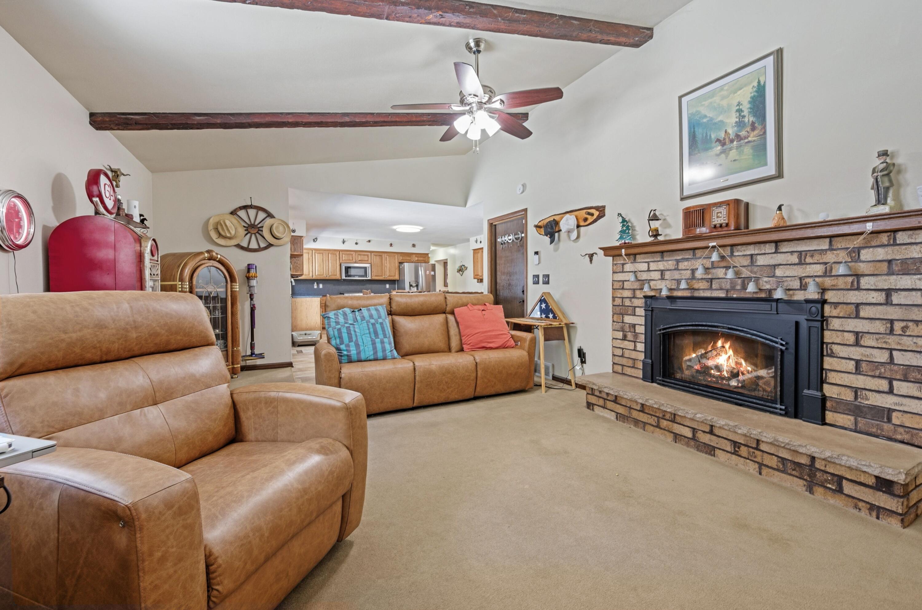 3641 North Main Street North Bay, WI 53402 - Photo 9 of 17 Family room with gas fireplace a