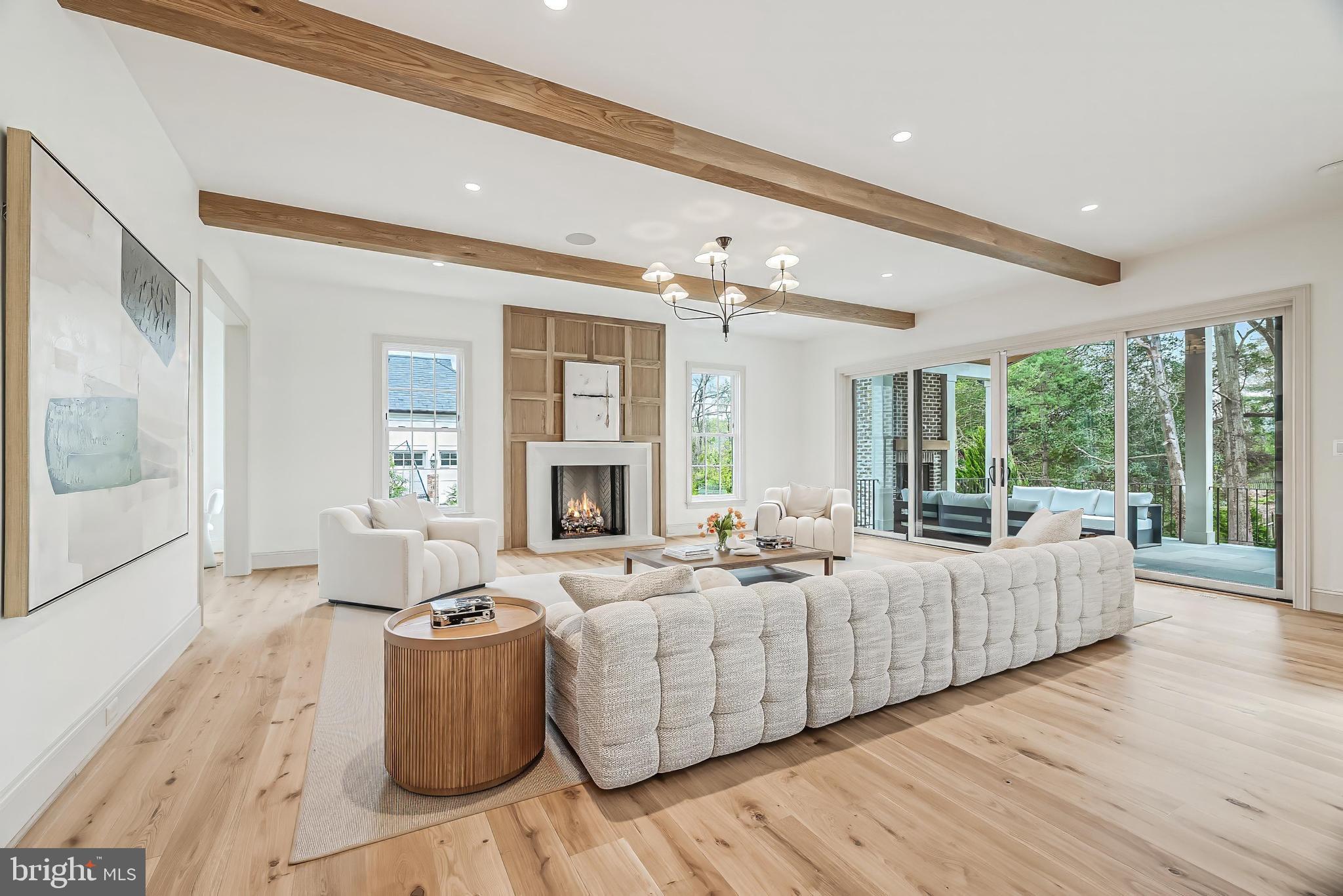 6913 Benjamin Street McLean, VA 22101 - Photo 12 of 51 a living room with furniture and large windows