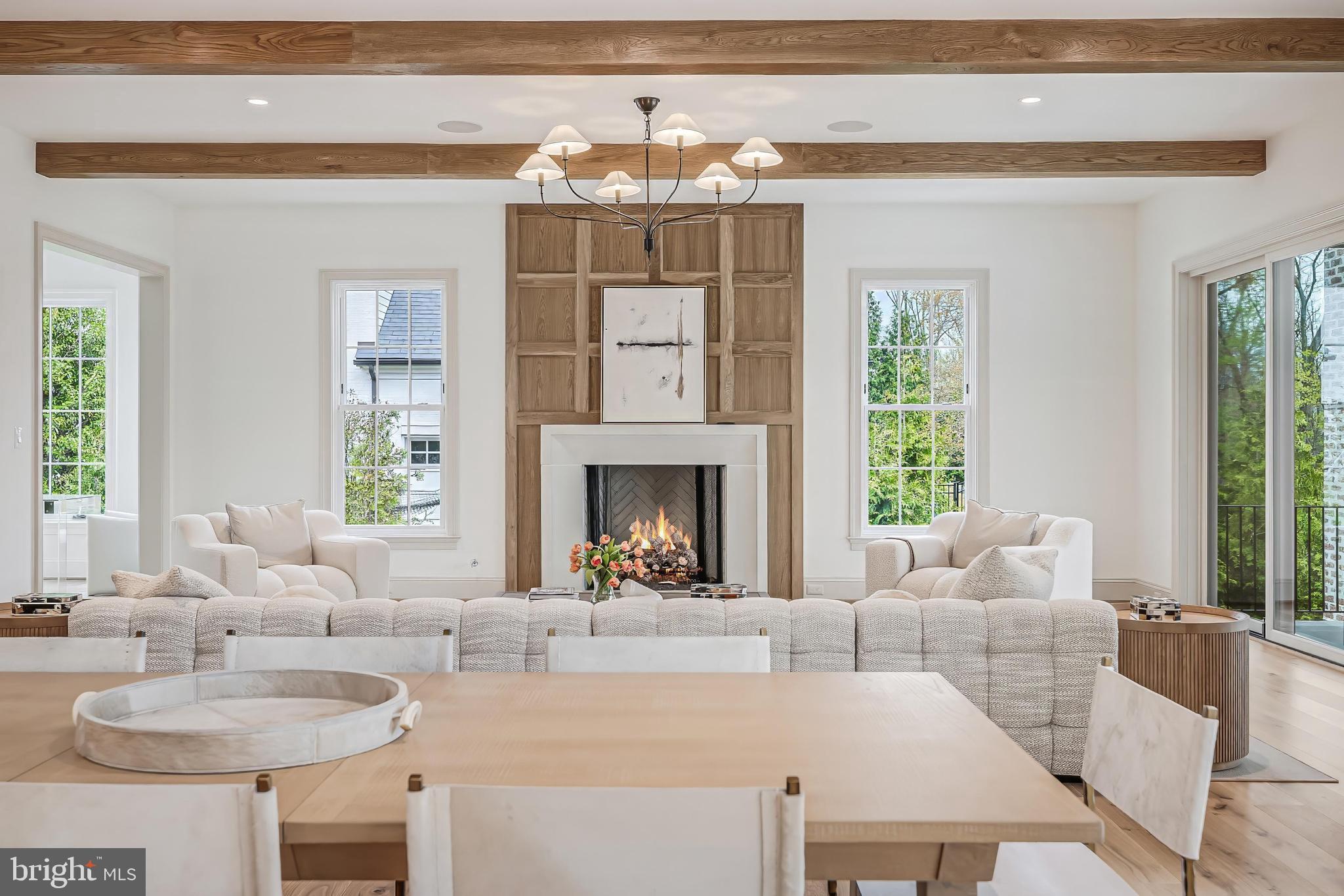 6913 Benjamin Street McLean, VA 22101 - Photo 13 of 51 a living room with furniture and a chandelier