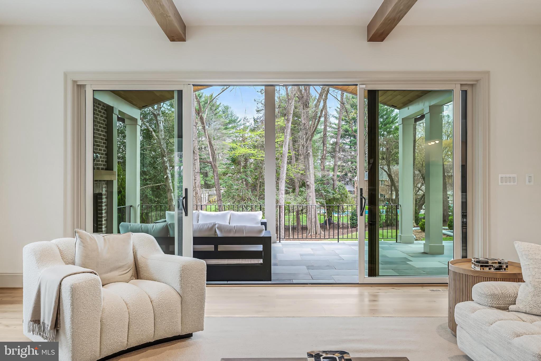 6913 Benjamin Street McLean, VA 22101 - Photo 14 of 51 a living room with furniture and a large window