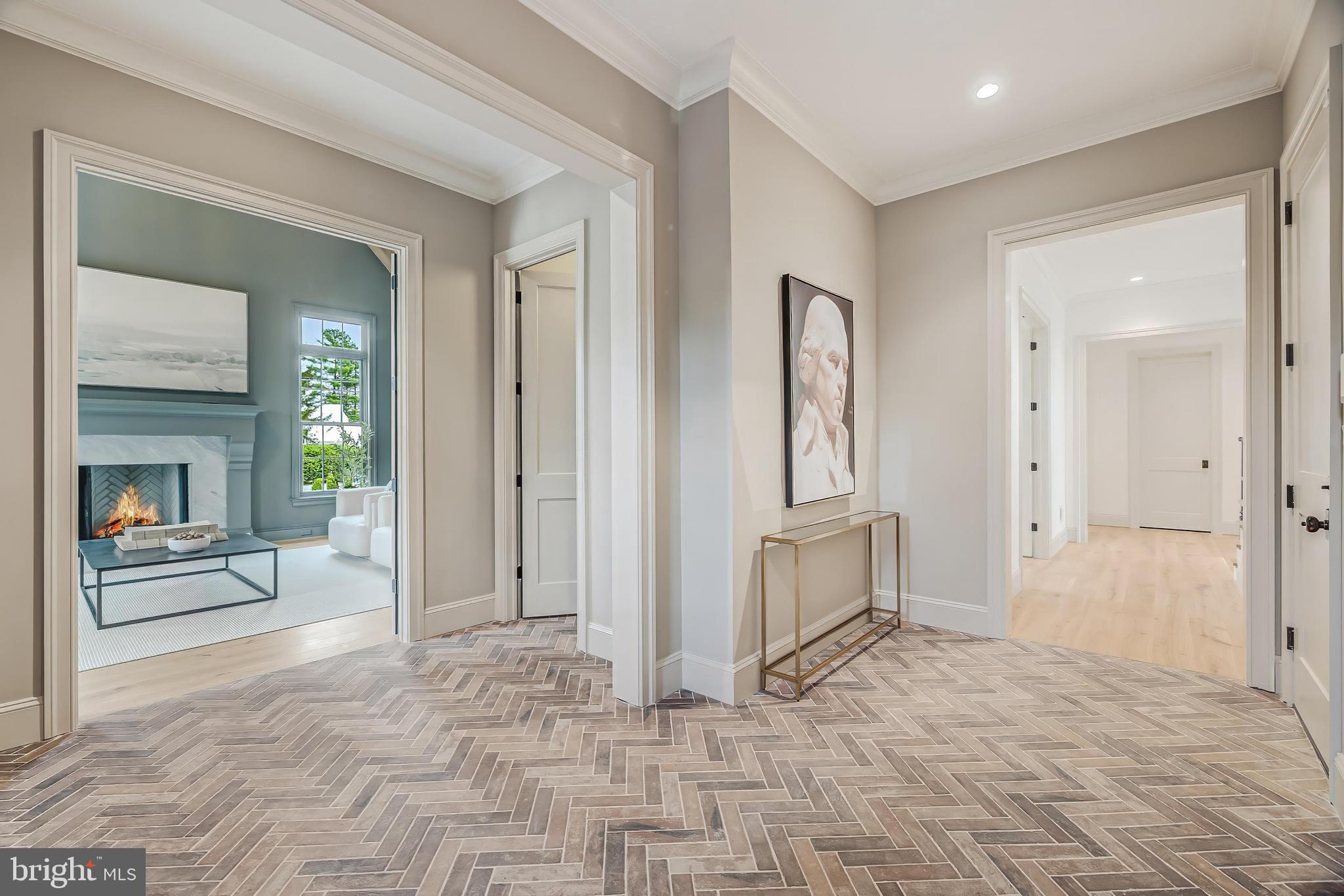 6913 Benjamin Street McLean, VA 22101 - Photo 27 of 51 a view of a hallway with wooden cabinet and livingroom view