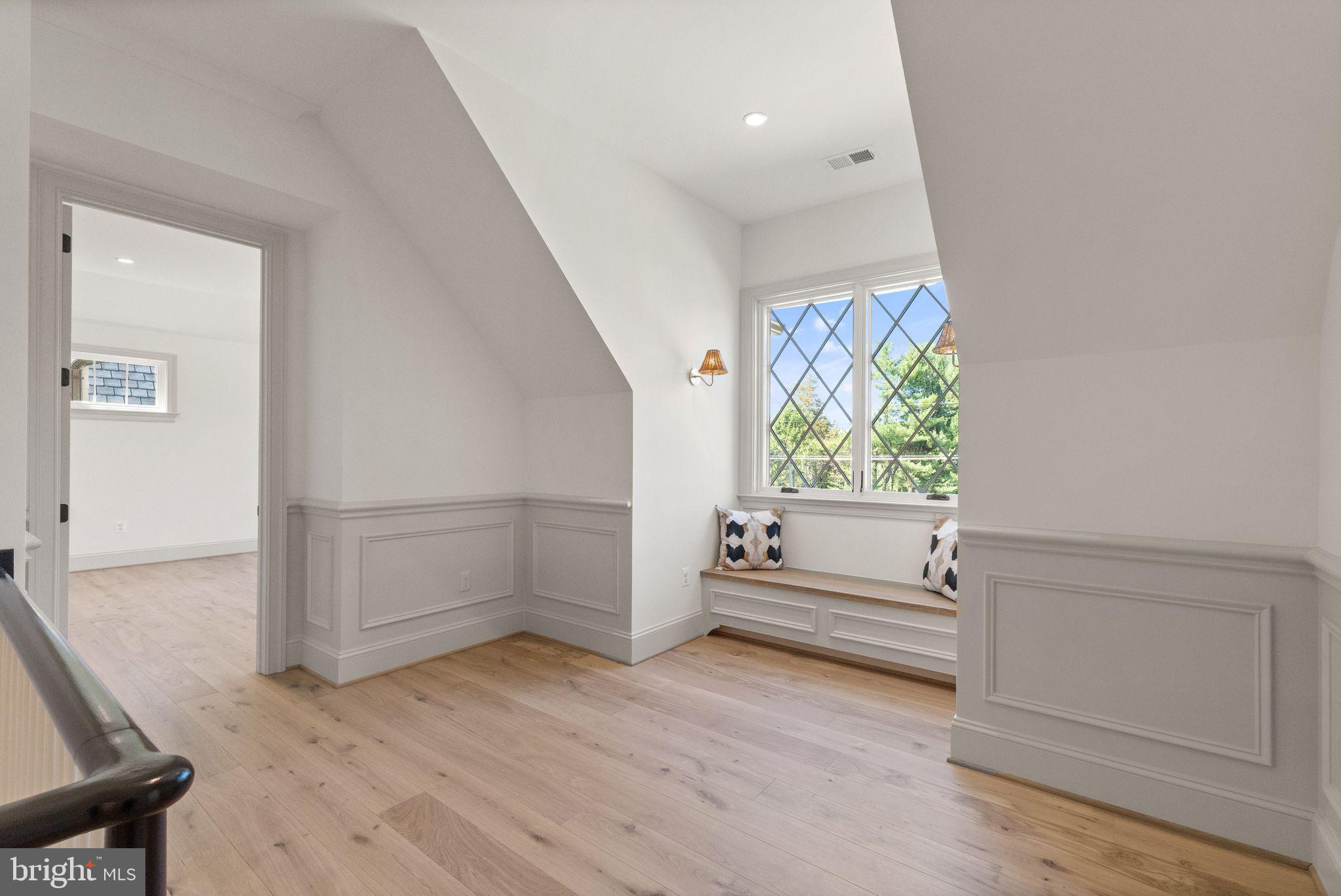 6913 Benjamin Street McLean, VA 22101 - Photo 40 of 51 wooden floor in an empty room with a window