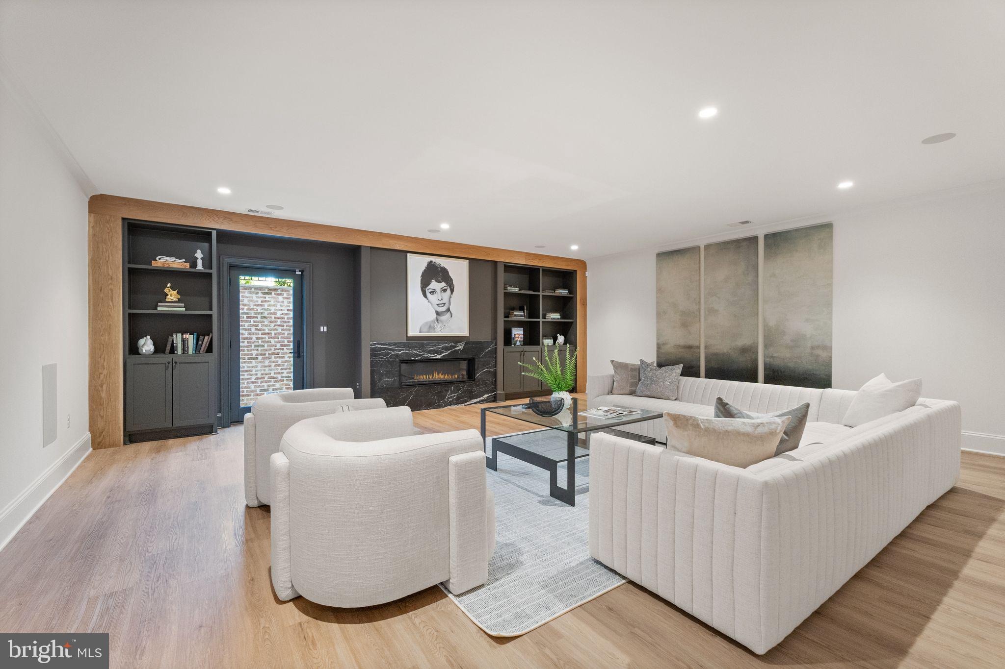 6913 Benjamin Street McLean, VA 22101 - Photo 45 of 51 a living room with furniture and a potted plant