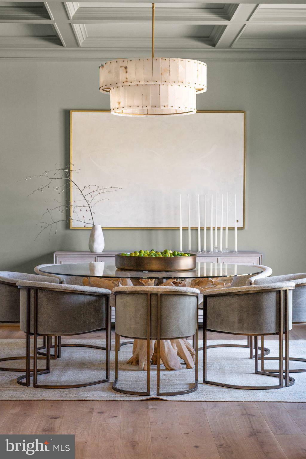 6913 Benjamin Street McLean, VA 22101 - Photo 6 of 51 a living room with a table and chairs