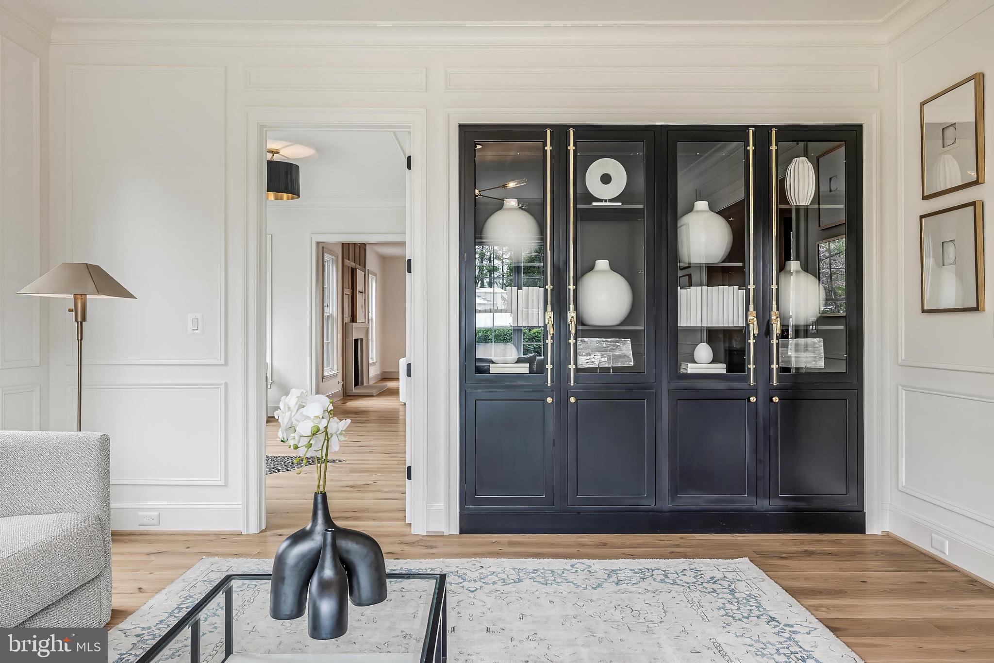 6913 Benjamin Street McLean, VA 22101 - Photo 8 of 51 a view of entryway with livingroom and glass door