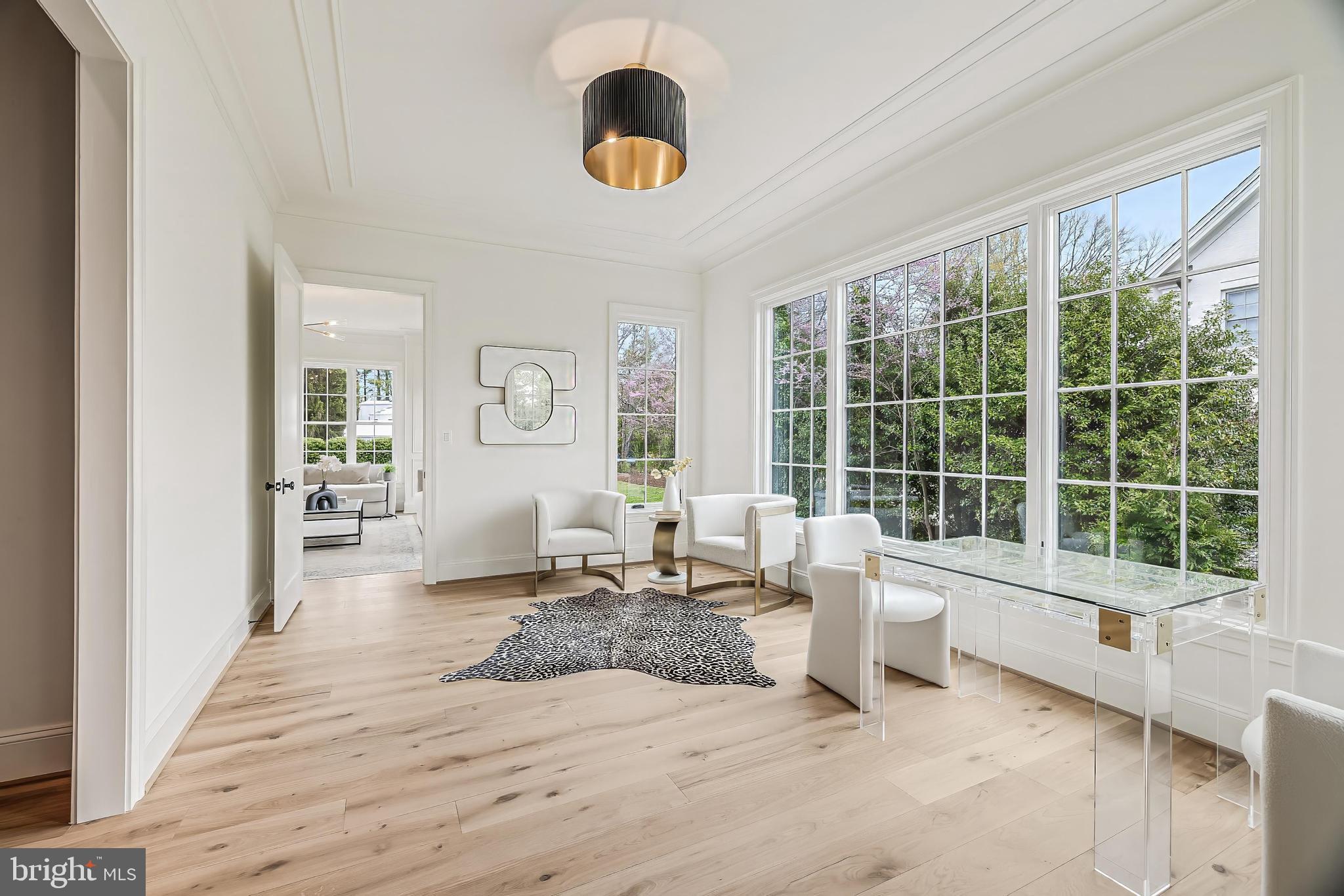 6913 Benjamin Street McLean, VA 22101 - Photo 9 of 51 a living room with furniture and a large window