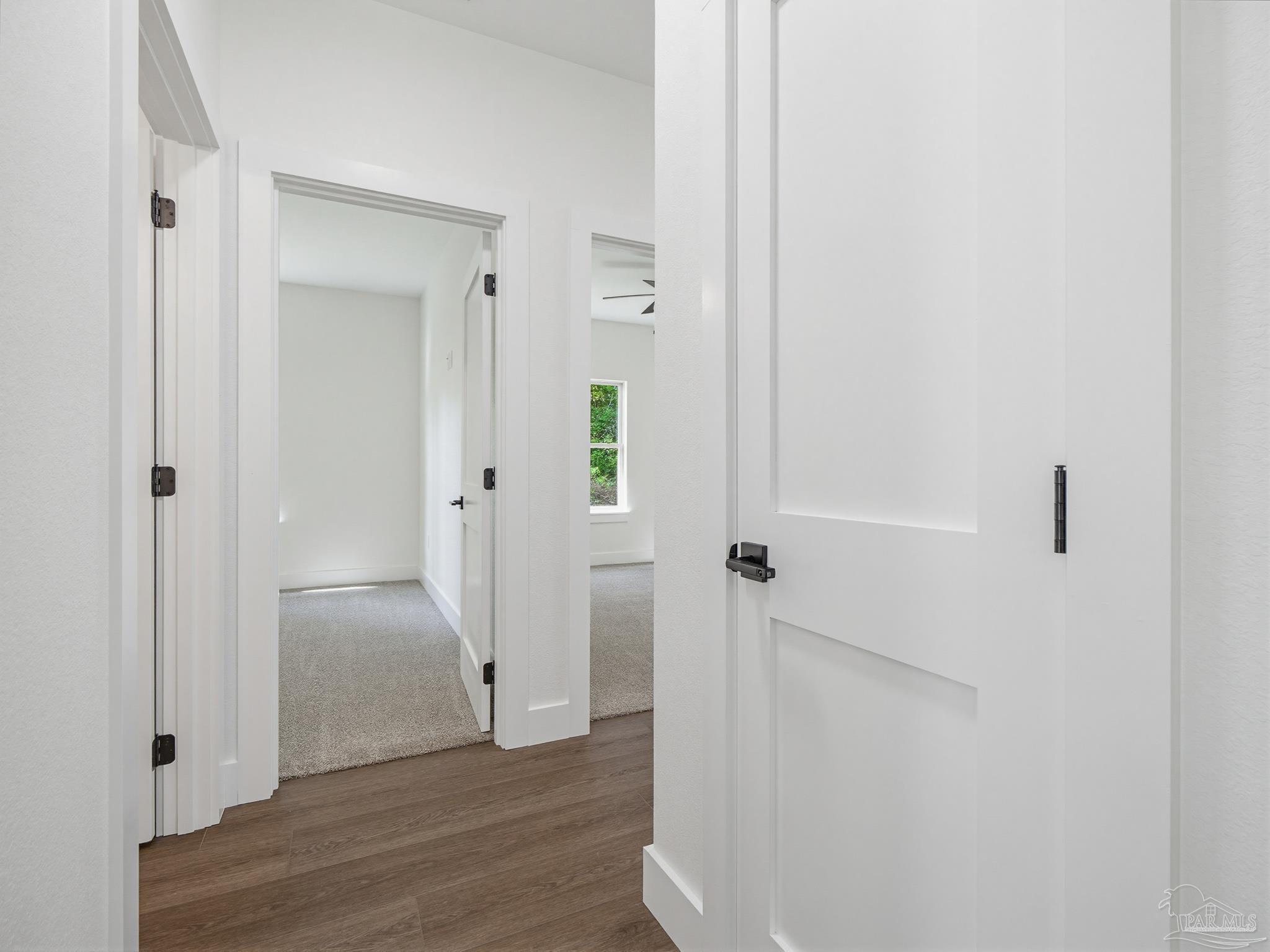 5724 Riviera Drive Milton, FL 32583 - Photo 34 of 52 a view of a bathroom with wooden floor