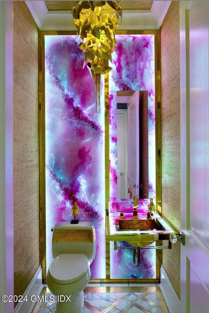 2 Oneida Drive, Unit C2 Greenwich, CT 06830 - Photo 13 of 26 a vase of flowers sitting on a floor