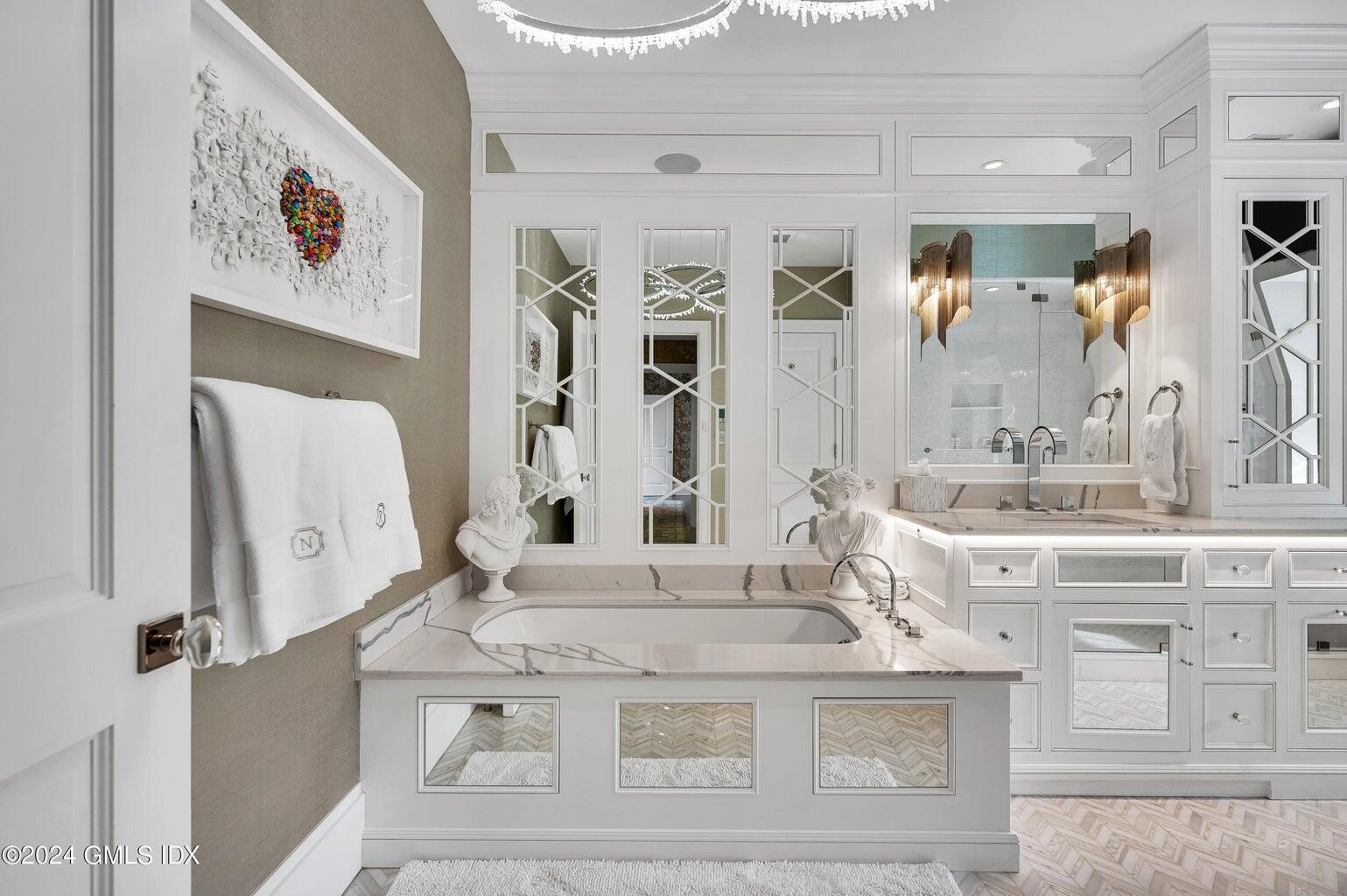 2 Oneida Drive, Unit C2 Greenwich, CT 06830 - Photo 17 of 26 a view of living room with granite countertop furniture and a large mirror