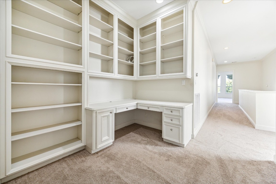 1231 West Pierce Street Houston, TX 77019 - Photo 30 of 33 a view of an empty room with white cabinet and a window