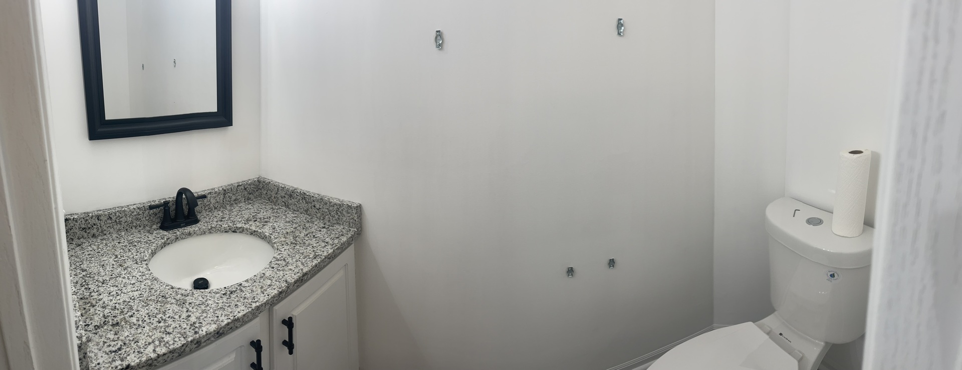 Undisclosed Address Round Lake, IL 60073 - Photo 7 of 15 a bathroom with a granite countertop sink and a mirror