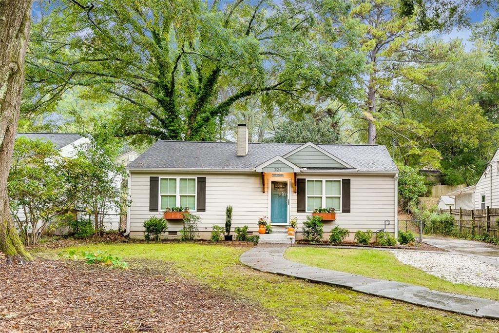 771 Clifton Road Southeast Atlanta, GA 30316 - Photo 1 of 1 a front view of a house with garden