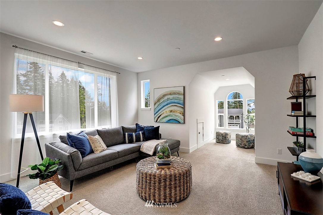 5 232nd Place Southeast Bothell, WA 98021 - Photo 11 of 21 a living room with furniture and a large window