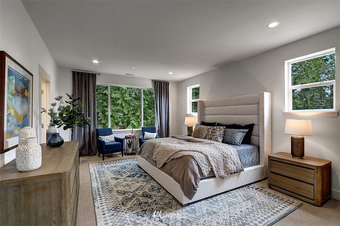 5 232nd Place Southeast Bothell, WA 98021 - Photo 13 of 21 a bedroom with a large bed and a window