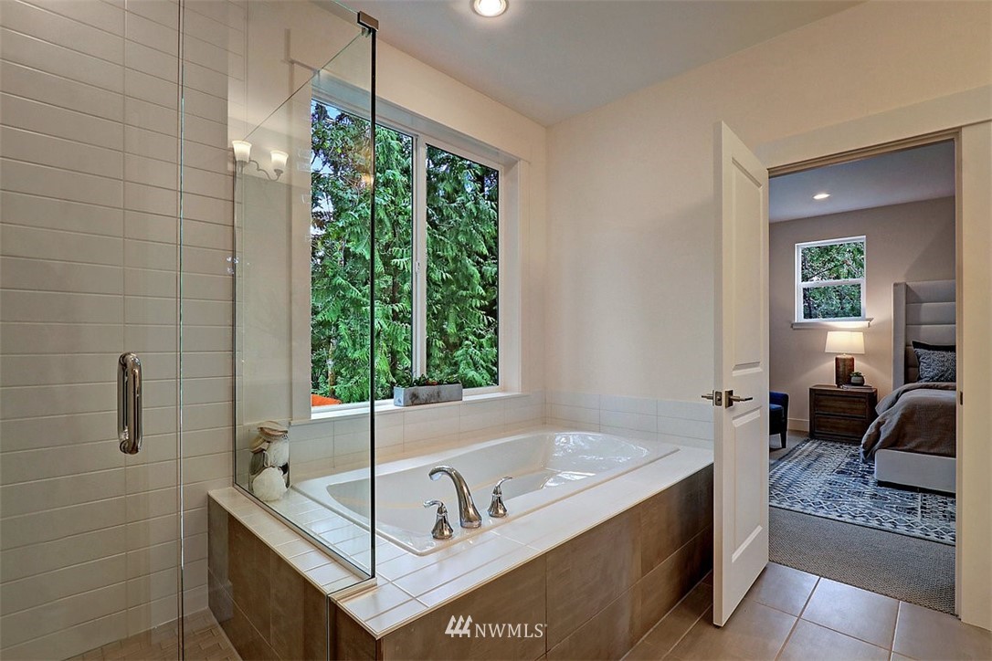 5 232nd Place Southeast Bothell, WA 98021 - Photo 15 of 21 a spacious bathroom with a tub a potted plant and a sink