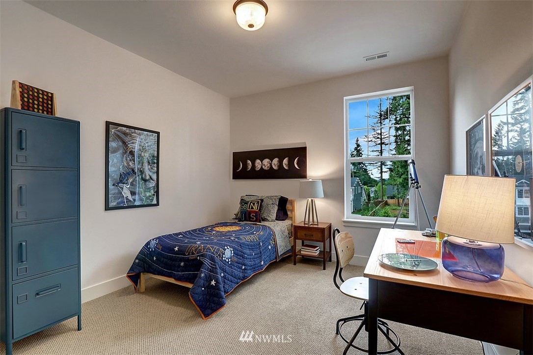 5 232nd Place Southeast Bothell, WA 98021 - Photo 19 of 21 a bedroom with furniture and a window