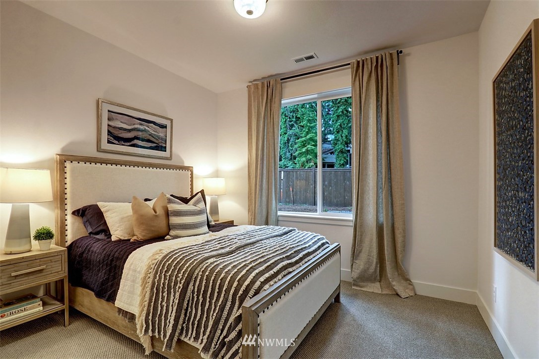 5 232nd Place Southeast Bothell, WA 98021 - Photo 10 of 21 a bedroom with a bed and window