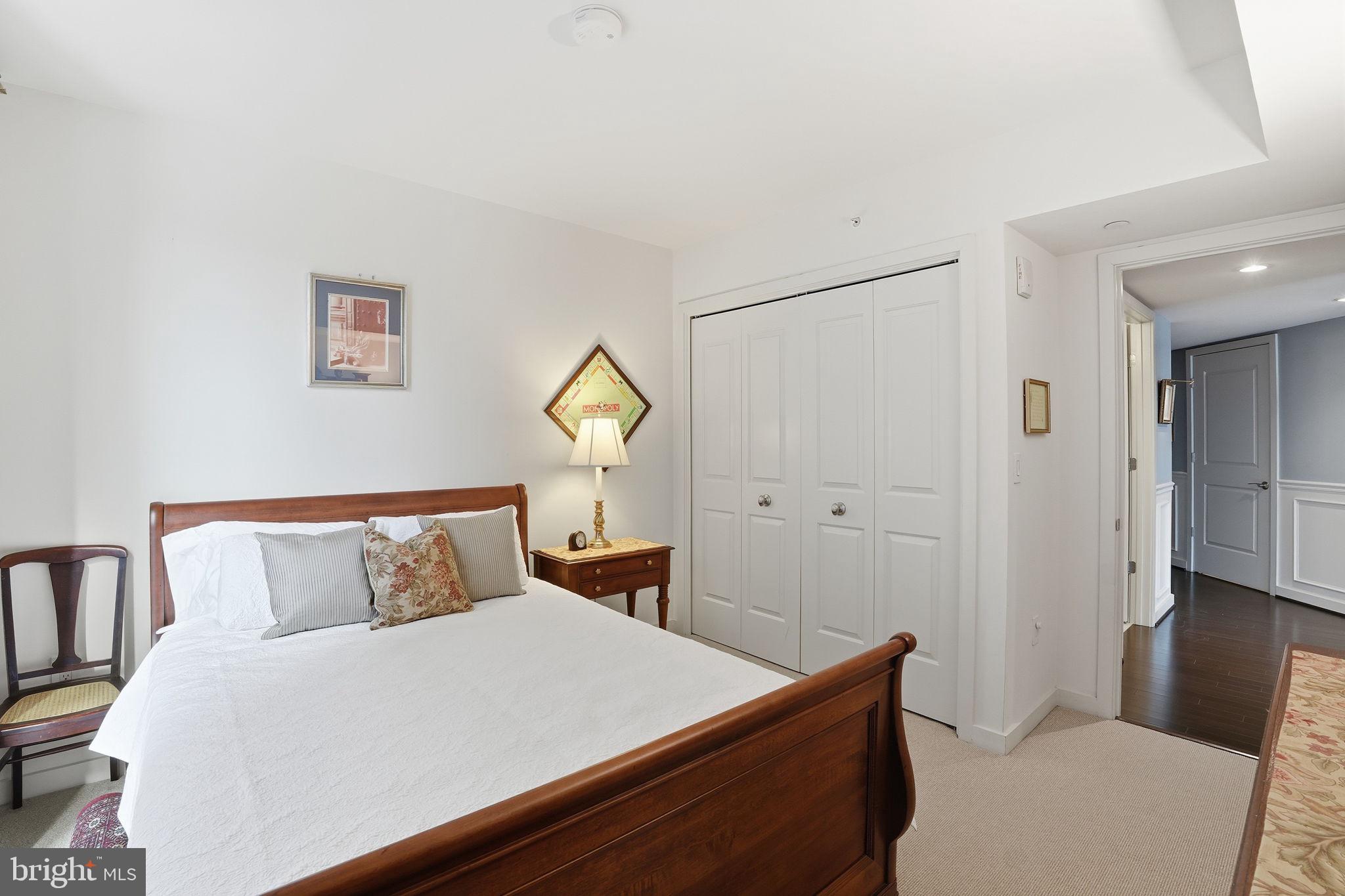 1025 First Street Southeast, Unit 906 Washington, DC 20003 - Photo 14 of 30 a bedroom with a bed and a window