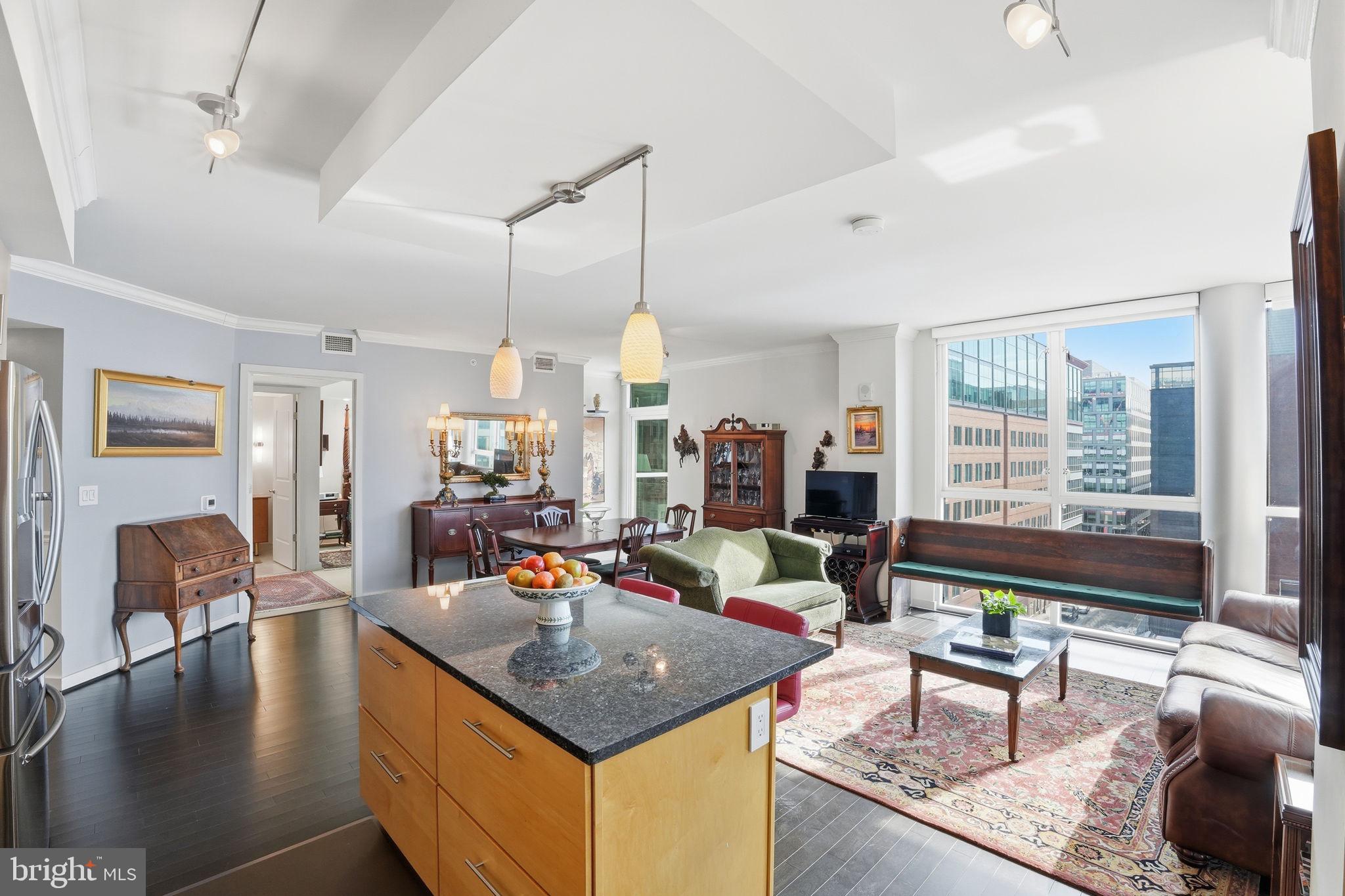 1025 First Street Southeast, Unit 906 Washington, DC 20003 - Photo 29 of 30 a living room with furniture and a large window