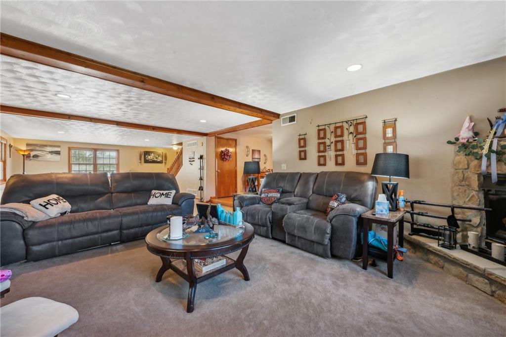 822 Old State Road Apollo, PA 15613 - Photo 11 of 22 a living room with furniture and a wooden floor