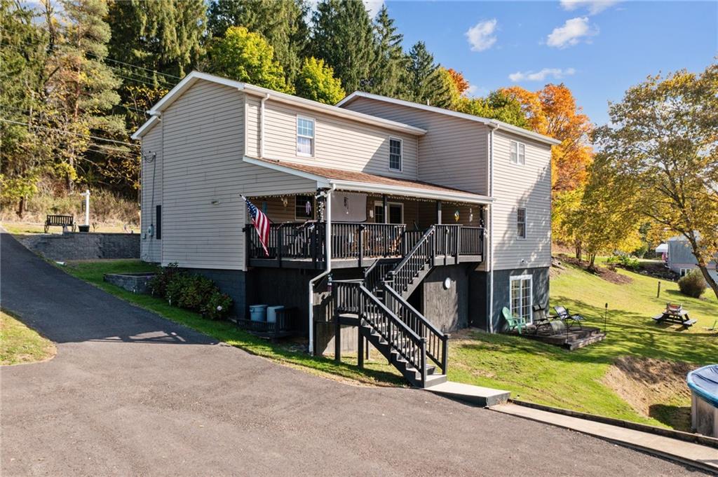 822 Old State Road Apollo, PA 15613 - Photo 21 of 22 a view of a house with yard and a street
