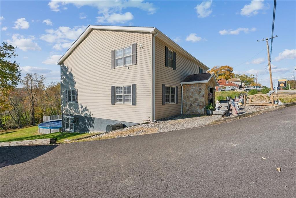 822 Old State Road Apollo, PA 15613 - Photo 3 of 22 a view of a house with a street
