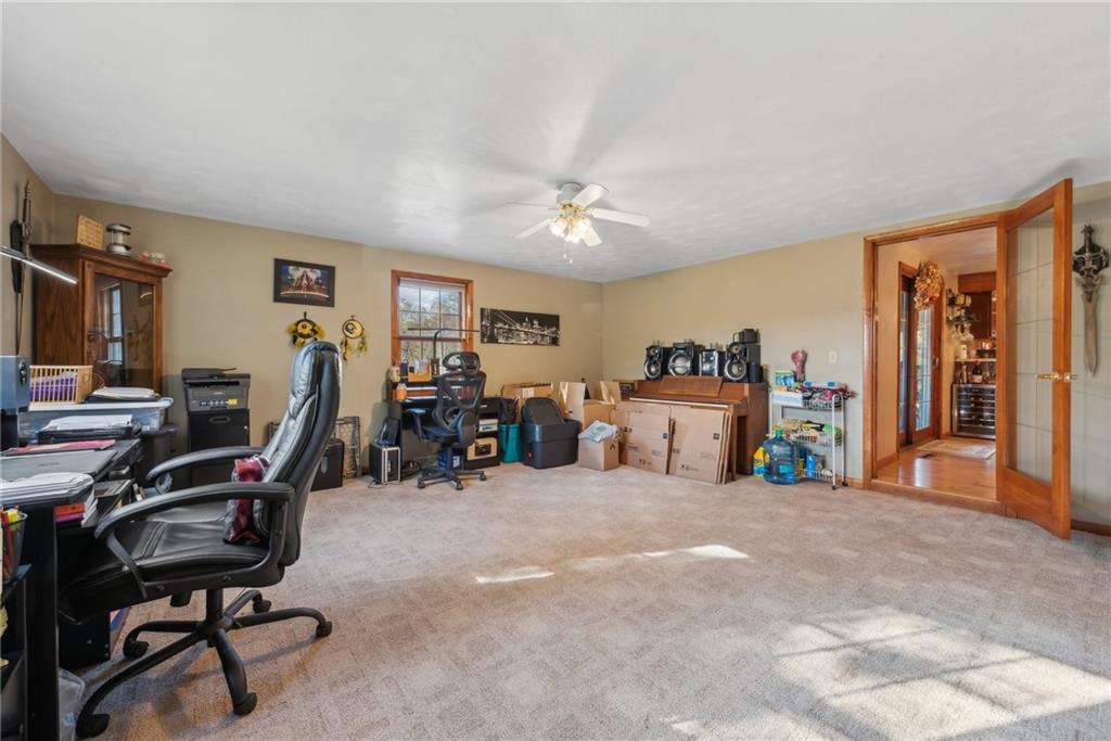 822 Old State Road Apollo, PA 15613 - Photo 5 of 22 a view of a workspace with furniture and a window