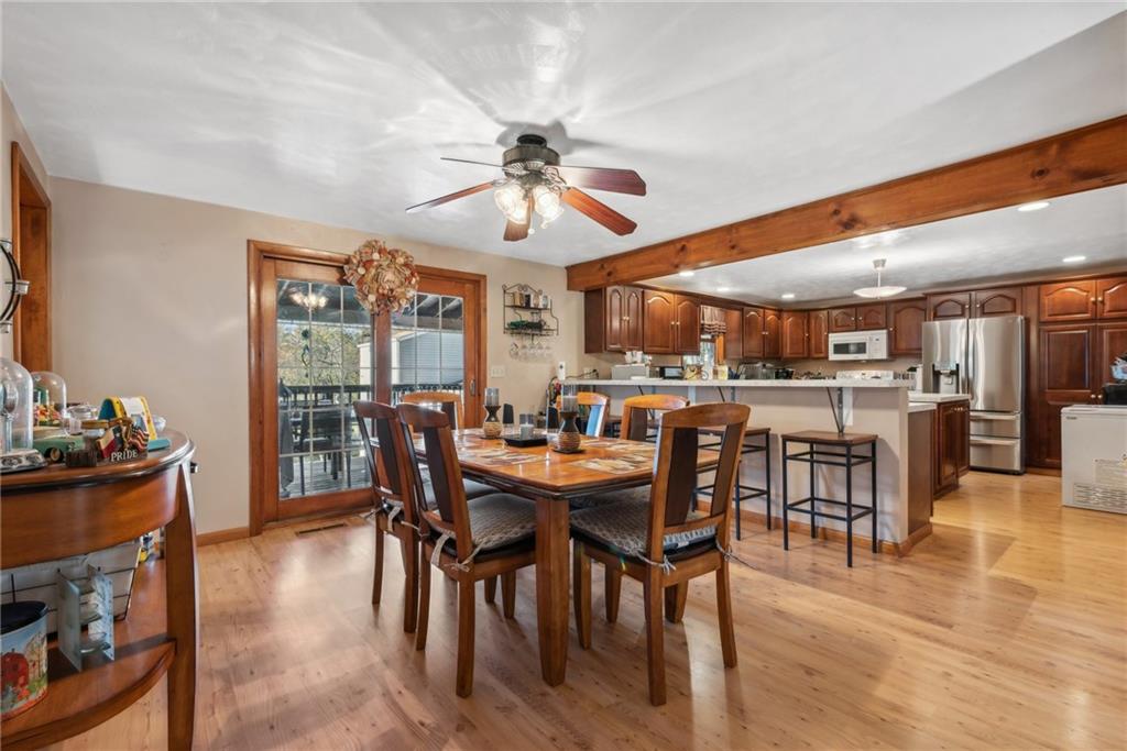 822 Old State Road Apollo, PA 15613 - Photo 9 of 22 a view of a dining room with furniture and wooden floor